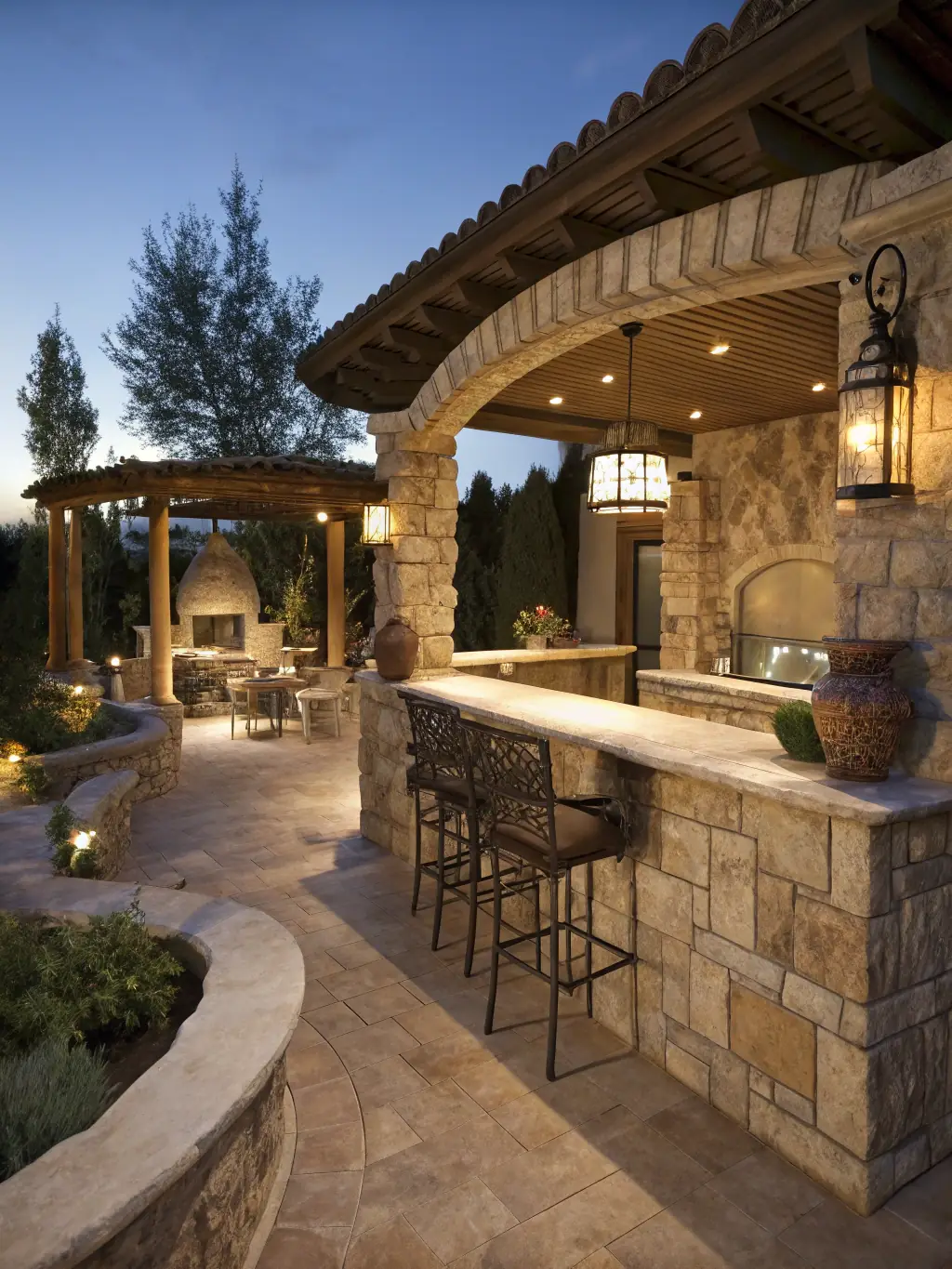 A newly constructed concrete patio with decorative stone accents and comfortable seating, demonstrating MVR Construction & Remodeling's exterior concrete work.